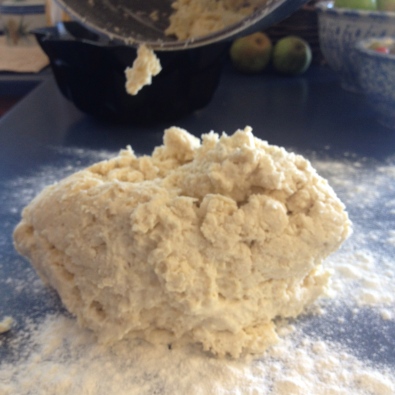 Dump dough onto heavily floured surface