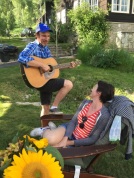 My husband serenading me with a song he wrote for me:)